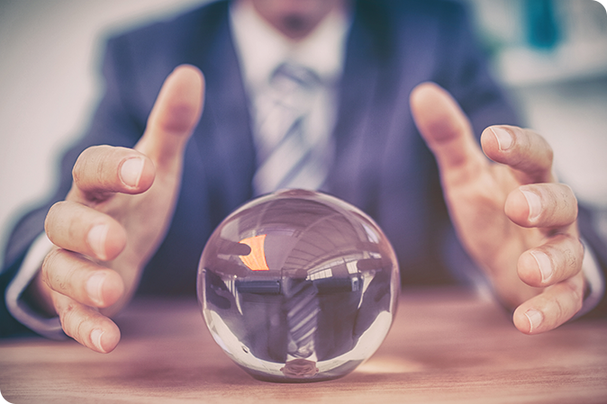 Man looking into crystal ball