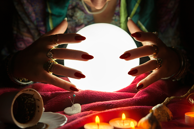 Woman looking into crystal ball