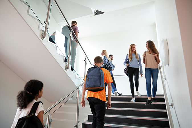 Young students on school stairs