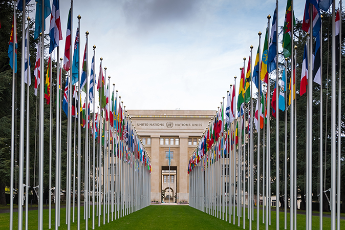 The United Nations building in New York with country flags