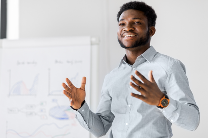Young man teaching a class
